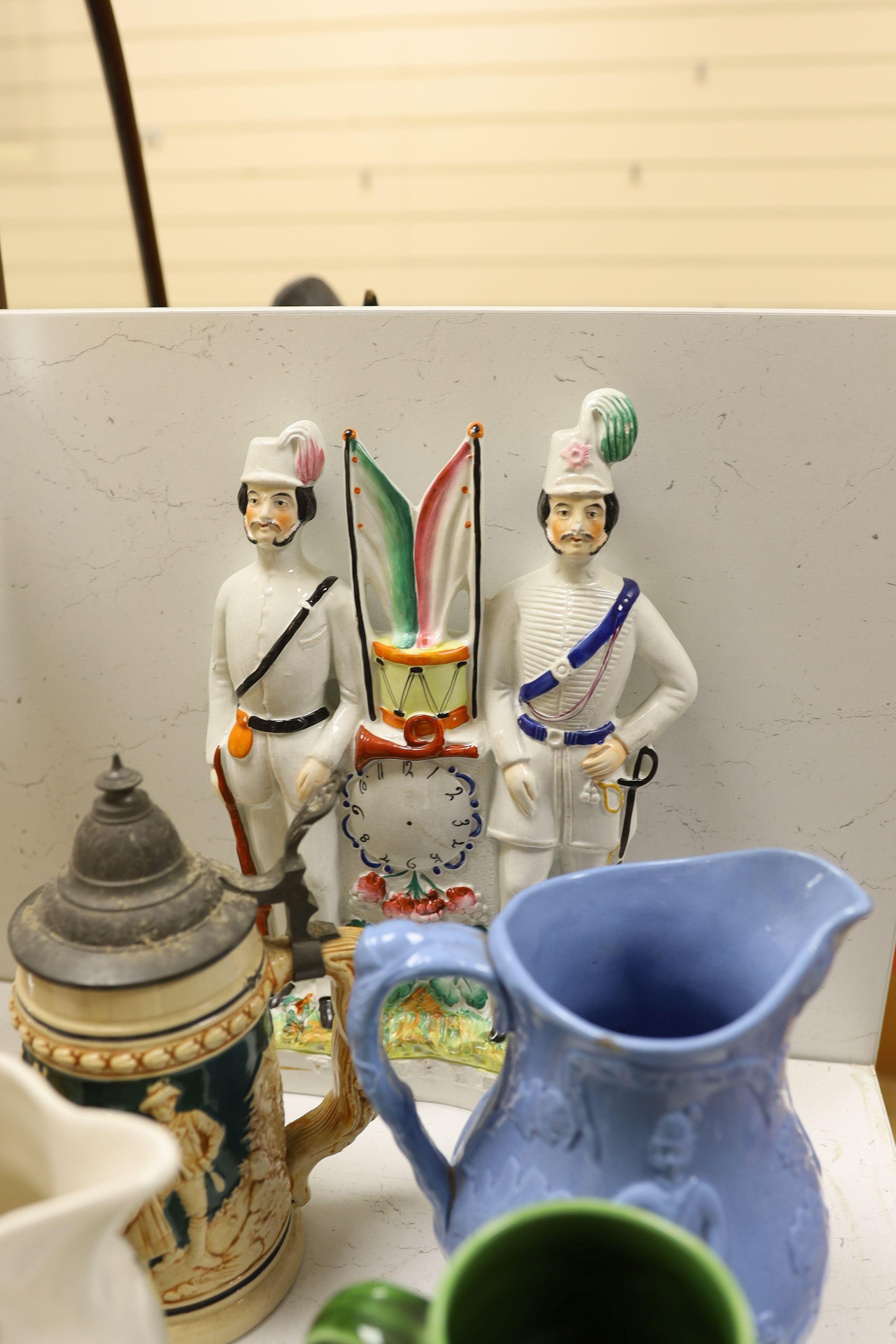 A collection of National Rifle Association ceramics.